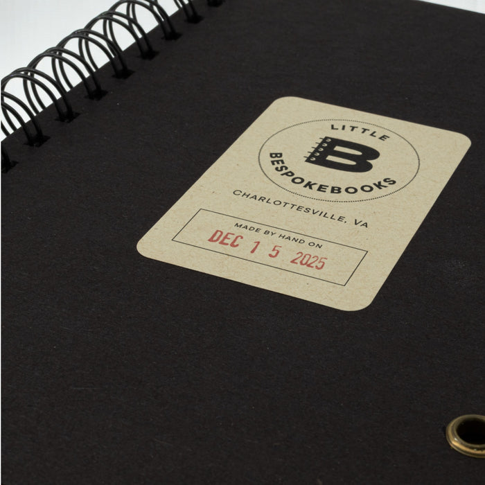 Inside back cover of the Game Night Journal with Little Bespokebooks label on a white background